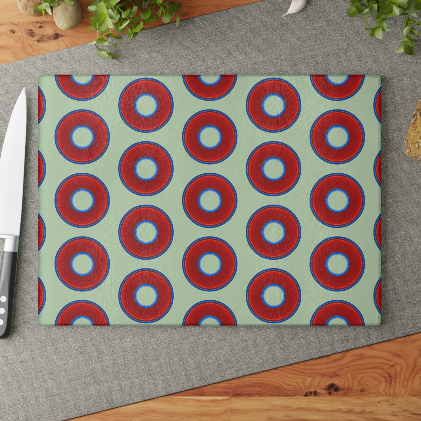 My Friend's Cutting Board - vivid red donuts w/seafoam background