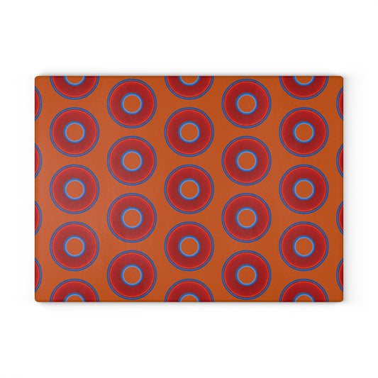 My Friend's Cutting Board - vivid red donuts w/dark orange background