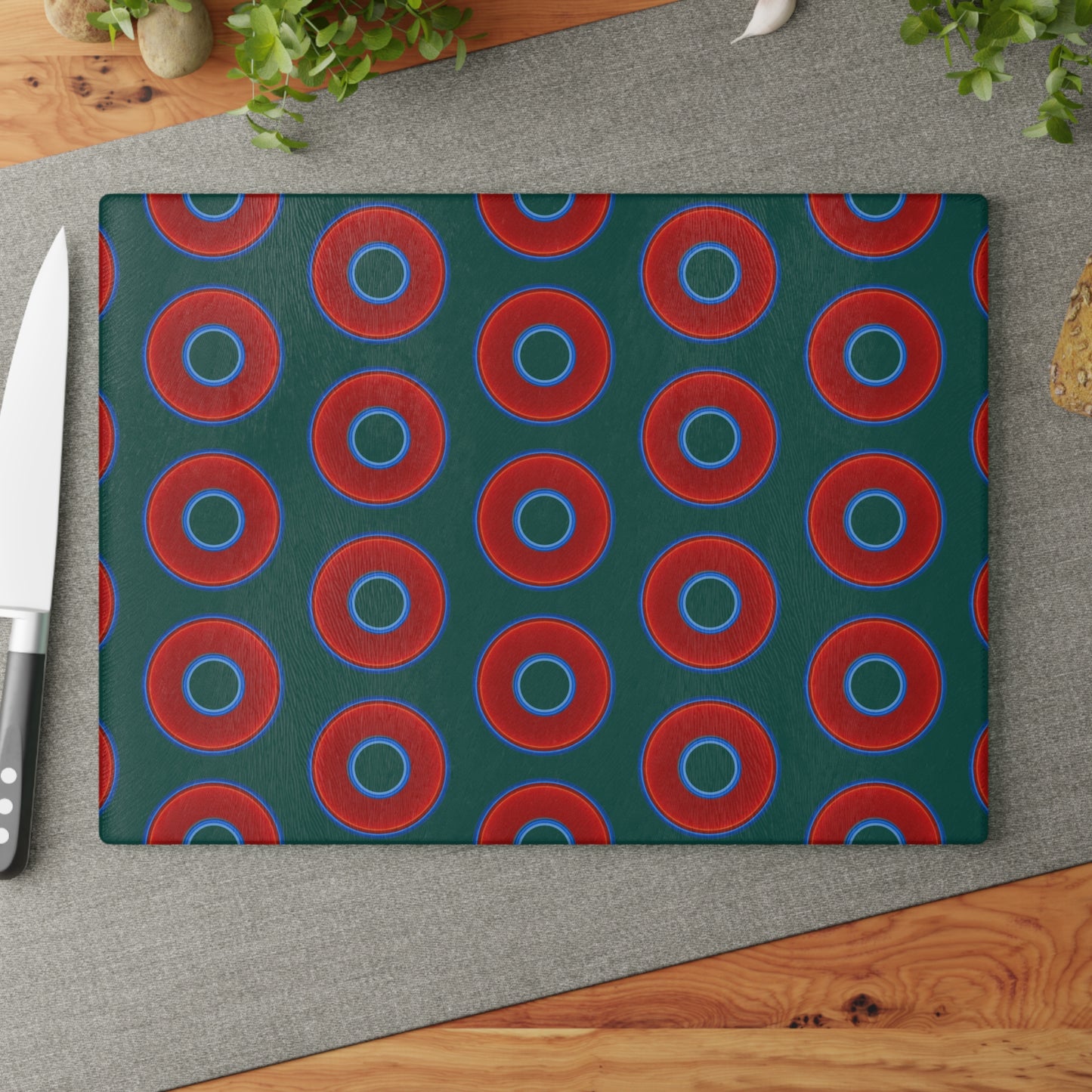 My Friend's Cutting Board - vivid red donuts w/dark Fenway green background