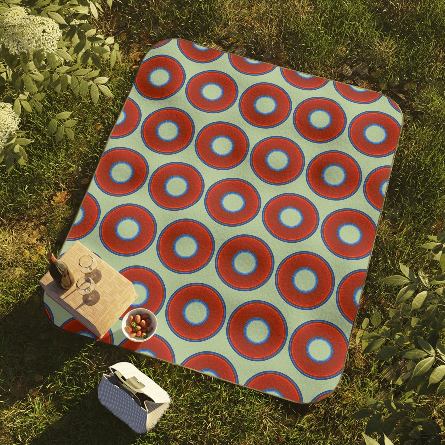 The Lumpy Party Blanket - giant water-resistant outdoor blanket [61" x 51"] - vivid red donuts w/seafoam background