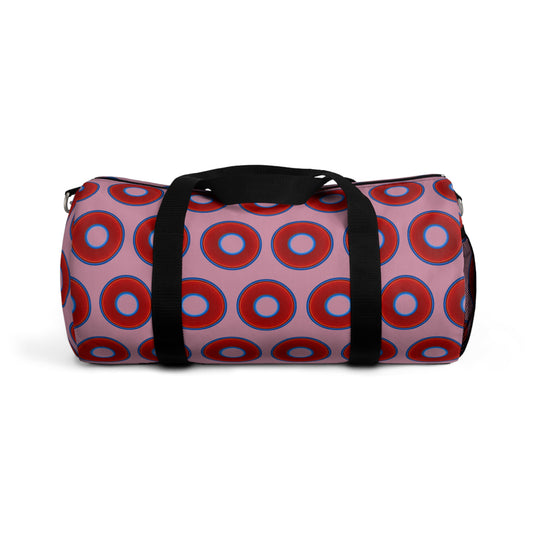 Lumpy Duffel - vivid red donuts w/pale magenta background