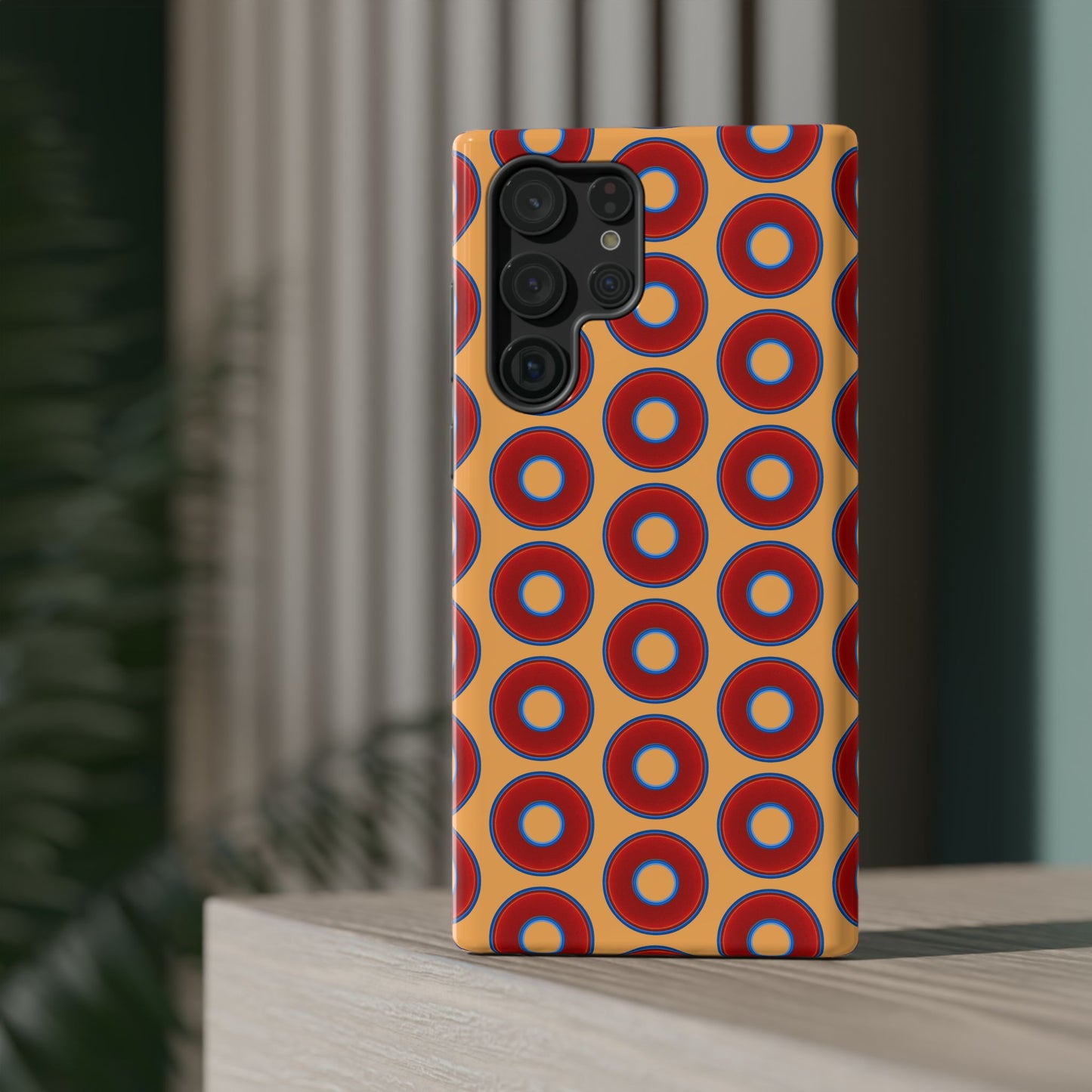 Impact-Resistant Lumpy Donut Case - red vivid donut print w/creamsicle orange background