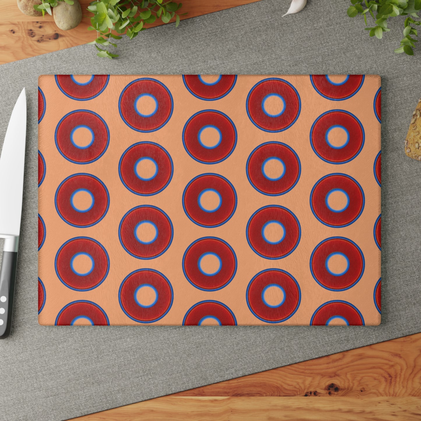 My Friend's Cutting Board - vivid red donuts w/peach background