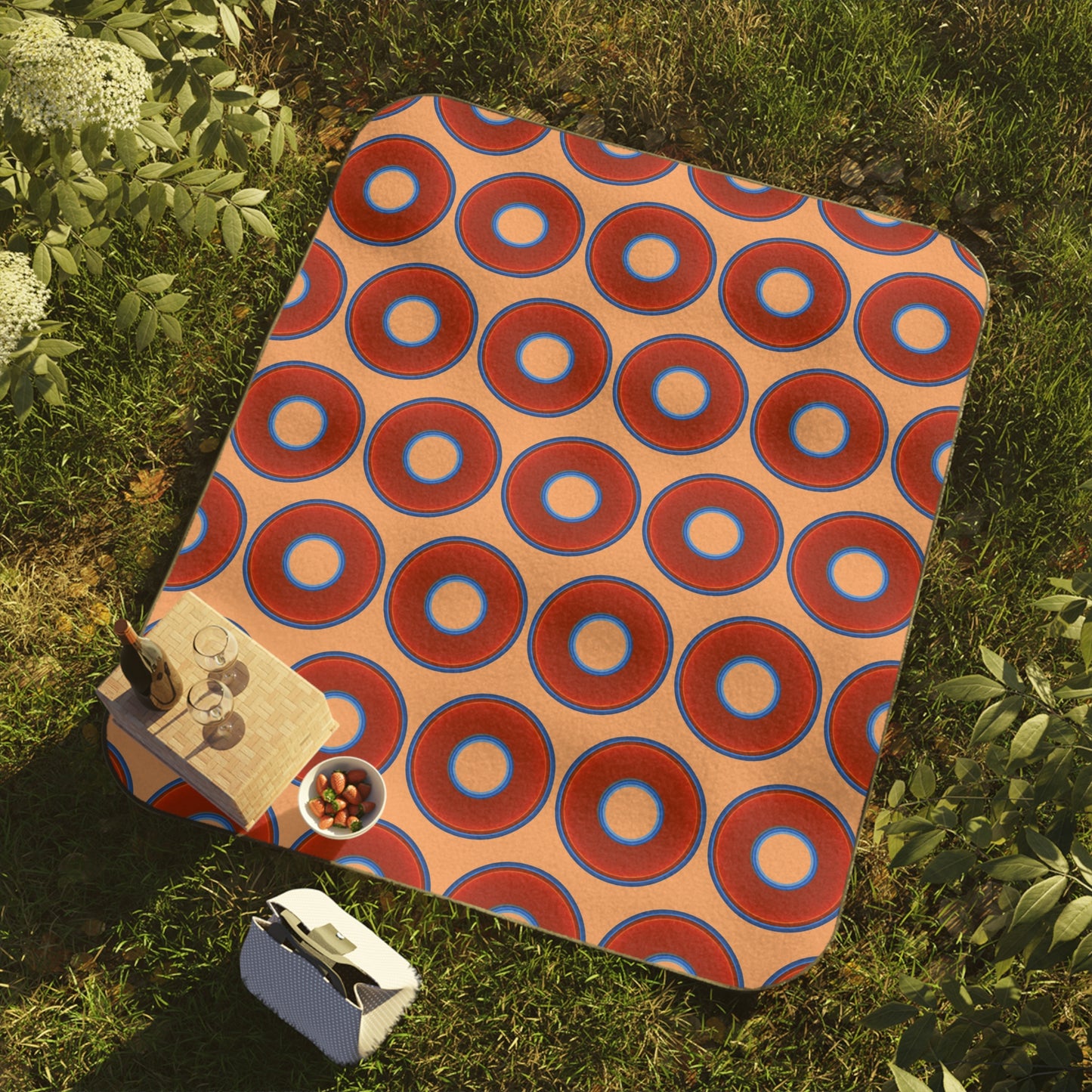 The Lumpy Party Blanket - giant water-resistant outdoor blanket [61" x 51"] - vivid red donuts w/peach background