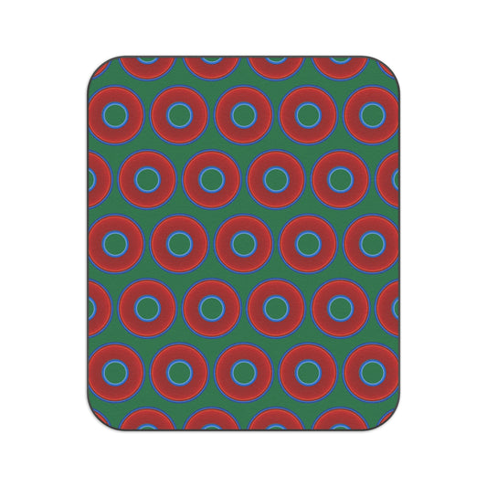 The Lumpy Party Blanket - giant water-resistant outdoor blanket [61" x 51"] - vivid red donuts w/green background