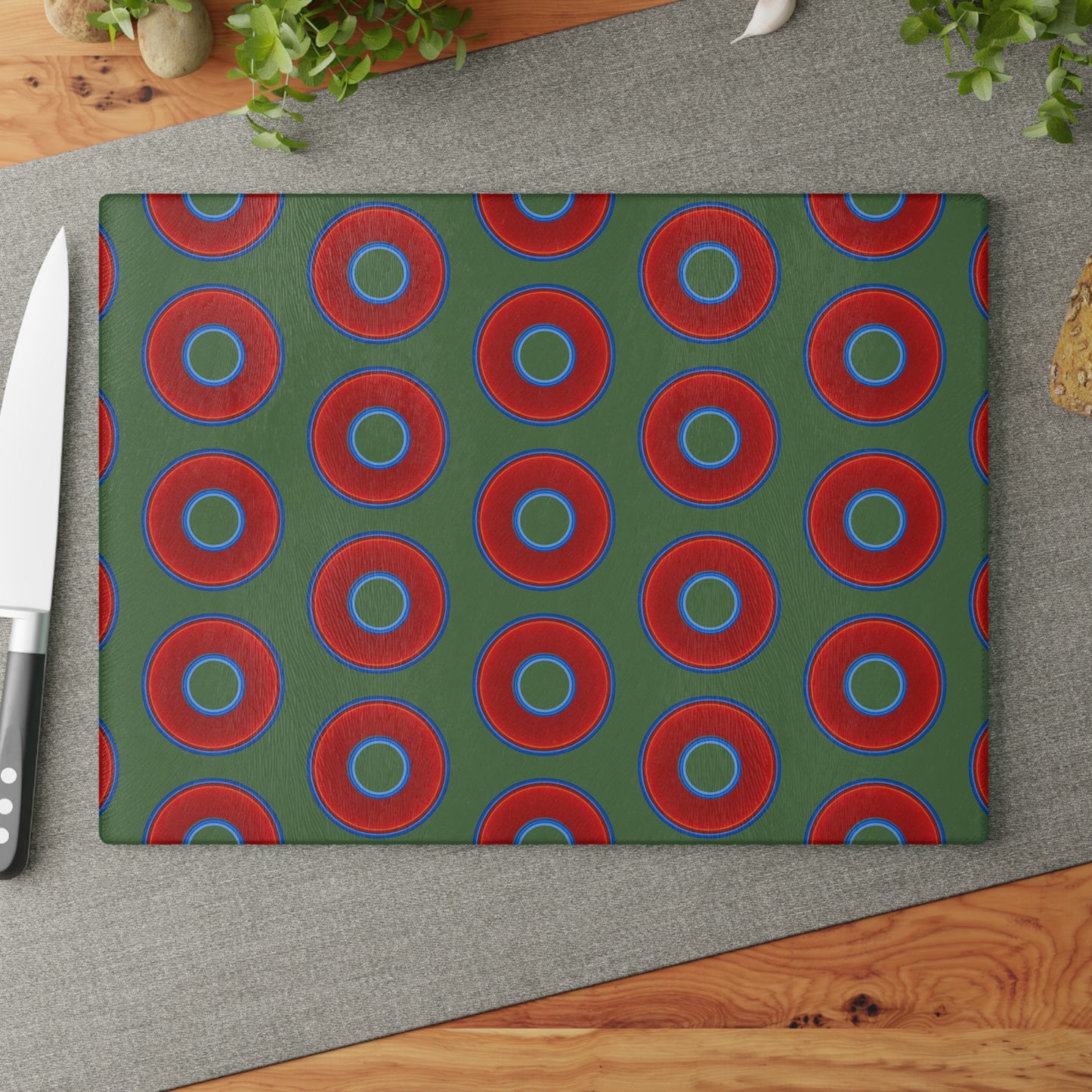 My Friend's Cutting Board - vivid red donuts w/dark green background