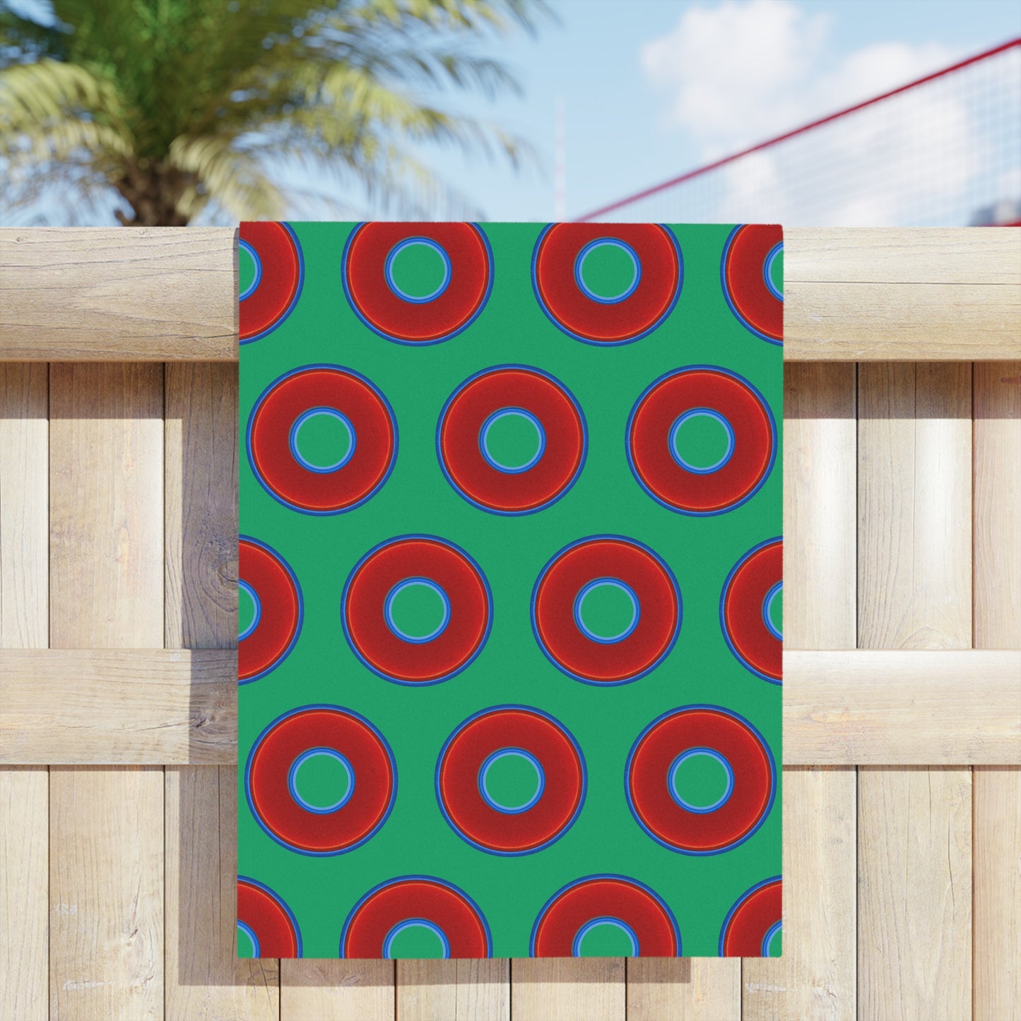 Lumpy Donut Towels - vivid red donuts w/jade green background