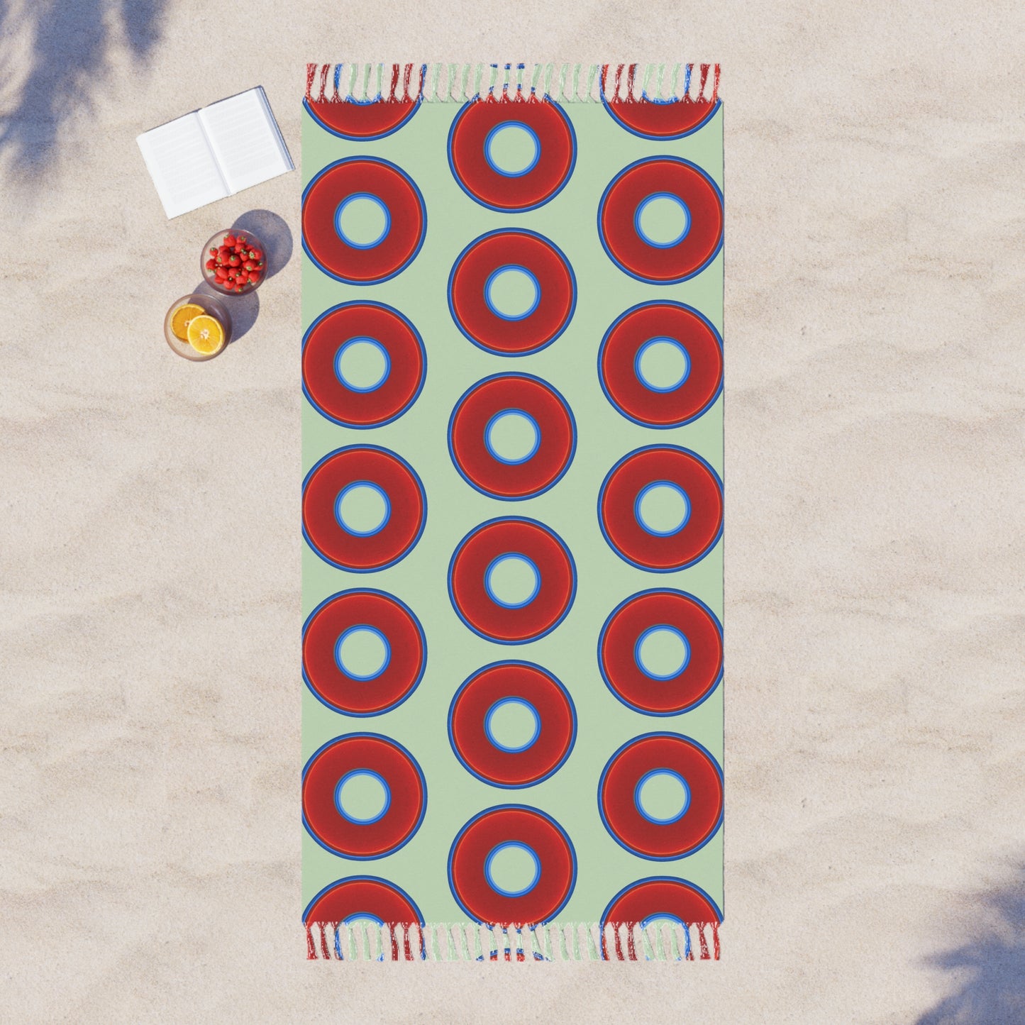 Oversized Lumpy Beach Towel - vivid red donuts w/seafoam background