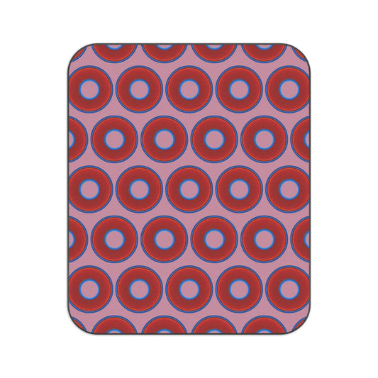 The Lumpy Party Blanket - giant water-resistant outdoor blanket [61" x 51"] - vivid red donuts w/pale magenta background