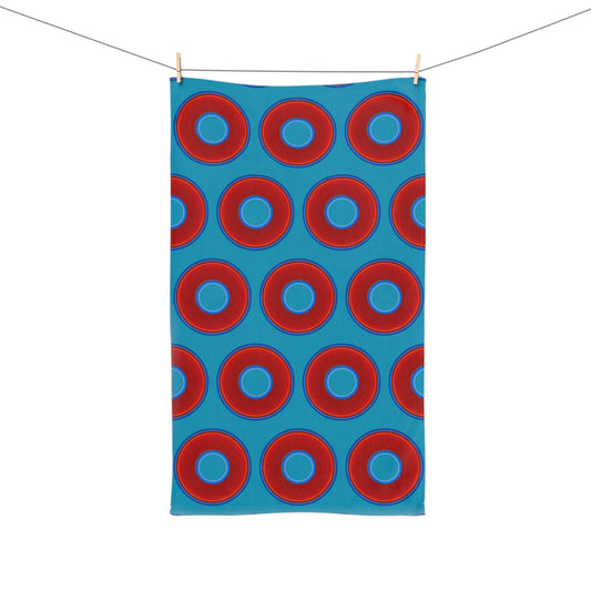 Lumpy Kitchen/Hand Towels - vivid red donuts w/aquamarine blue background