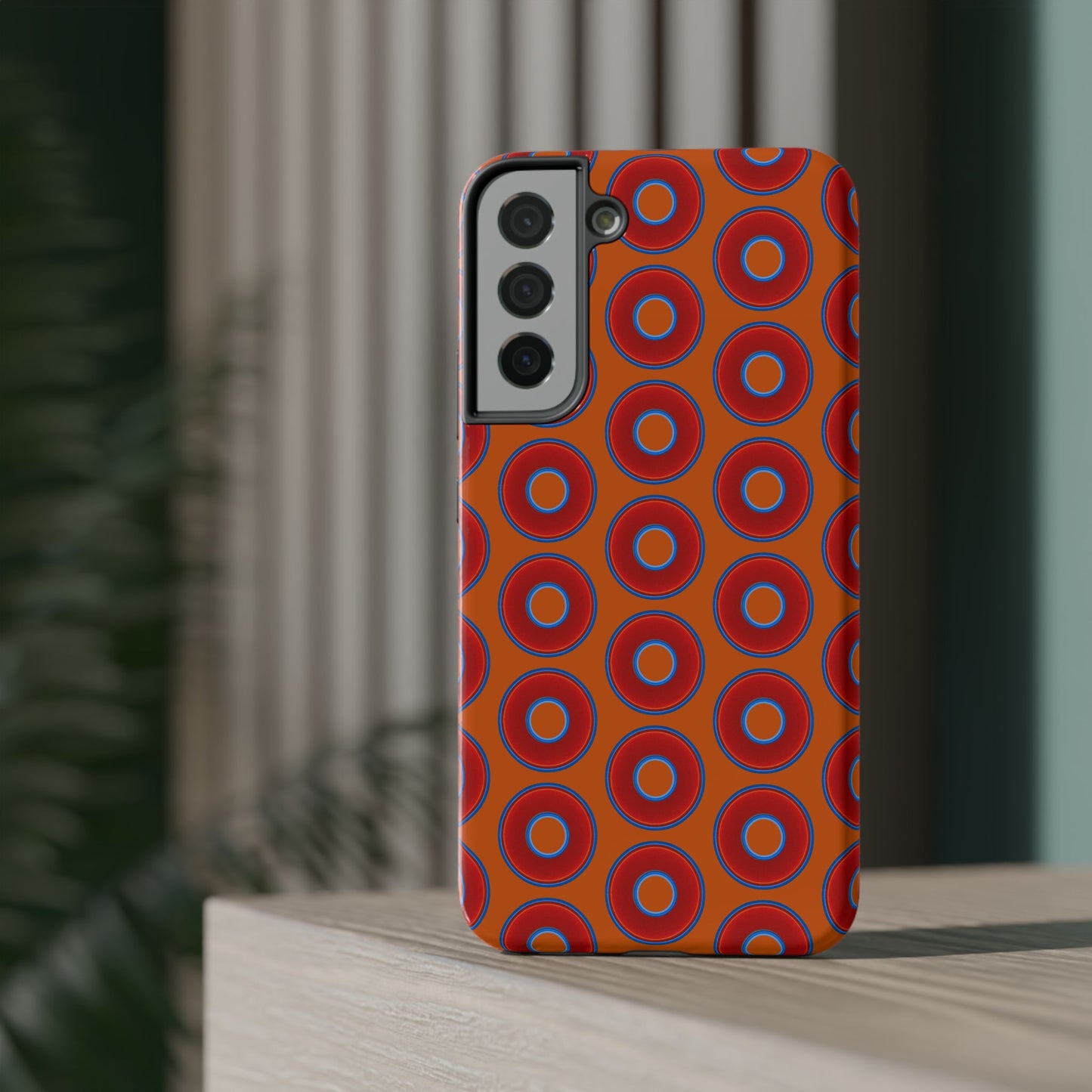 Impact-Resistant Lumpy Donut Case - red vivid donut print w/dark orange background