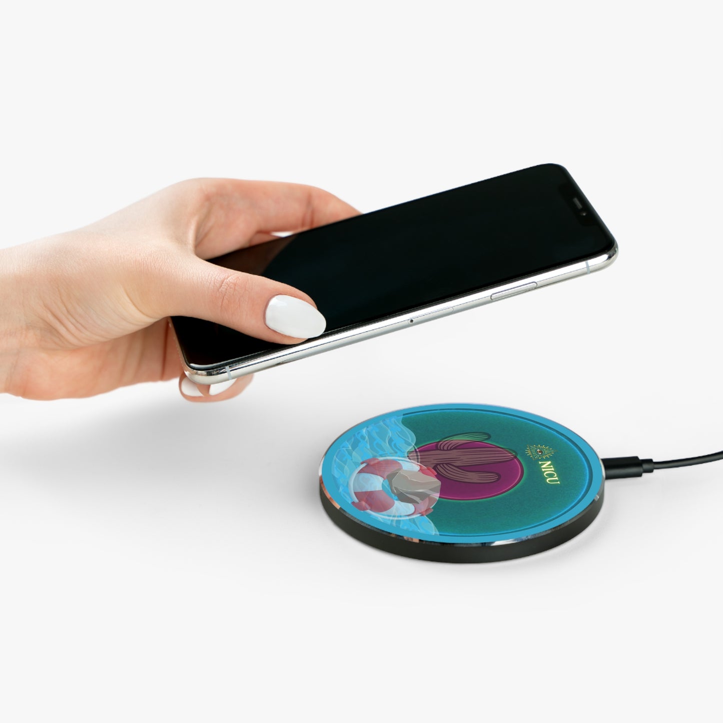 The Flow - Wireless Lumpy Donut Chargers - "The Charger that Conveys Wirelessly" - vivid dark teal donut w/turquoise background - variant 1