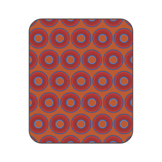 The Lumpy Party Blanket - giant water-resistant outdoor blanket [61" x 51"] - vivid red donuts w/dark orange background