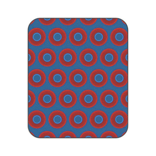 The Lumpy Party Blanket - giant water-resistant outdoor blanket [61" x 51"] - vivid red donuts w/wavy navy blue background