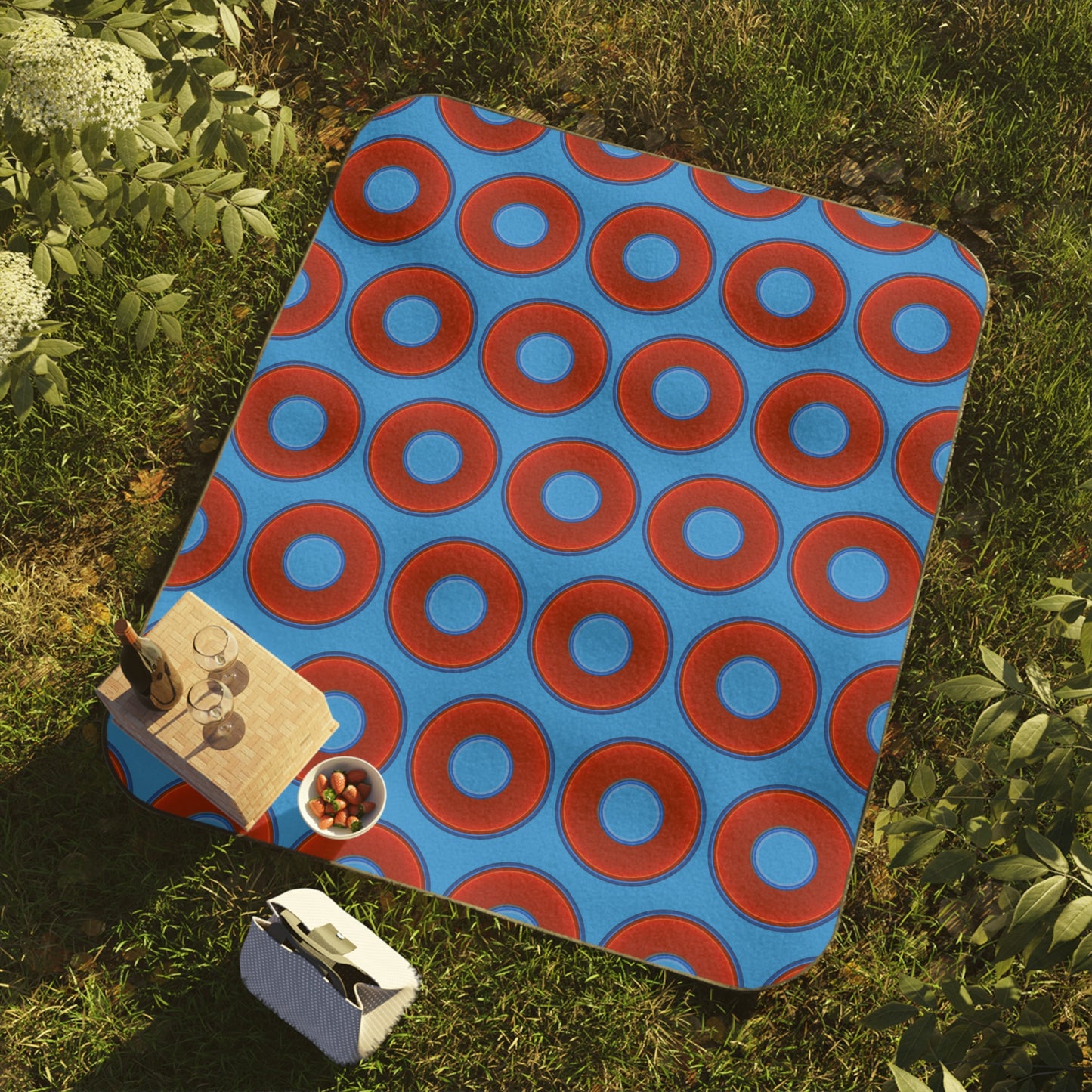 The Lumpy Party Blanket - giant water-resistant outdoor blanket [61" x 51"] - vivid red donuts w/sky royal blue background