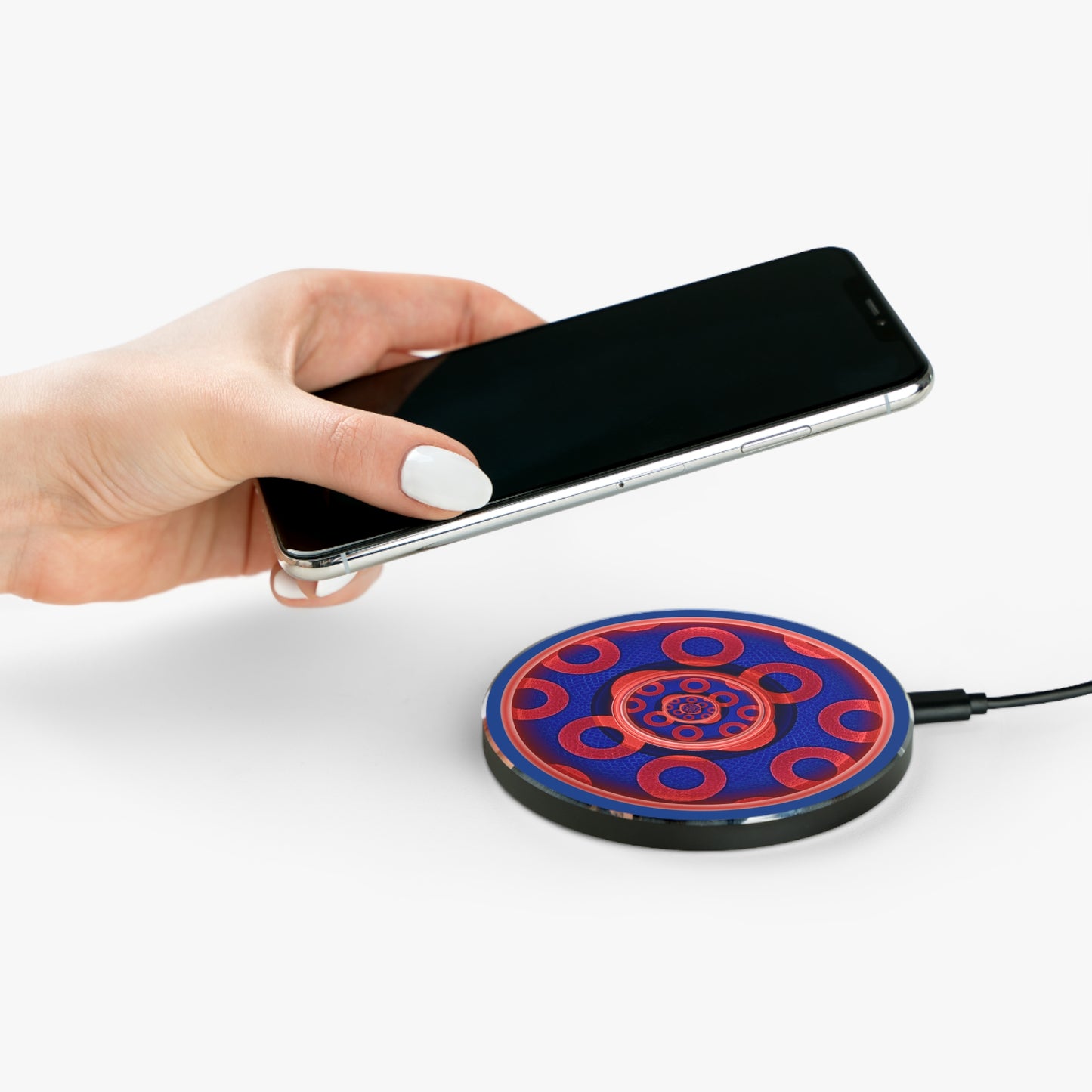 The Flow - Wireless Lumpy Donut Chargers - paradoxical rustic red/blue donut w/red background - variant 1