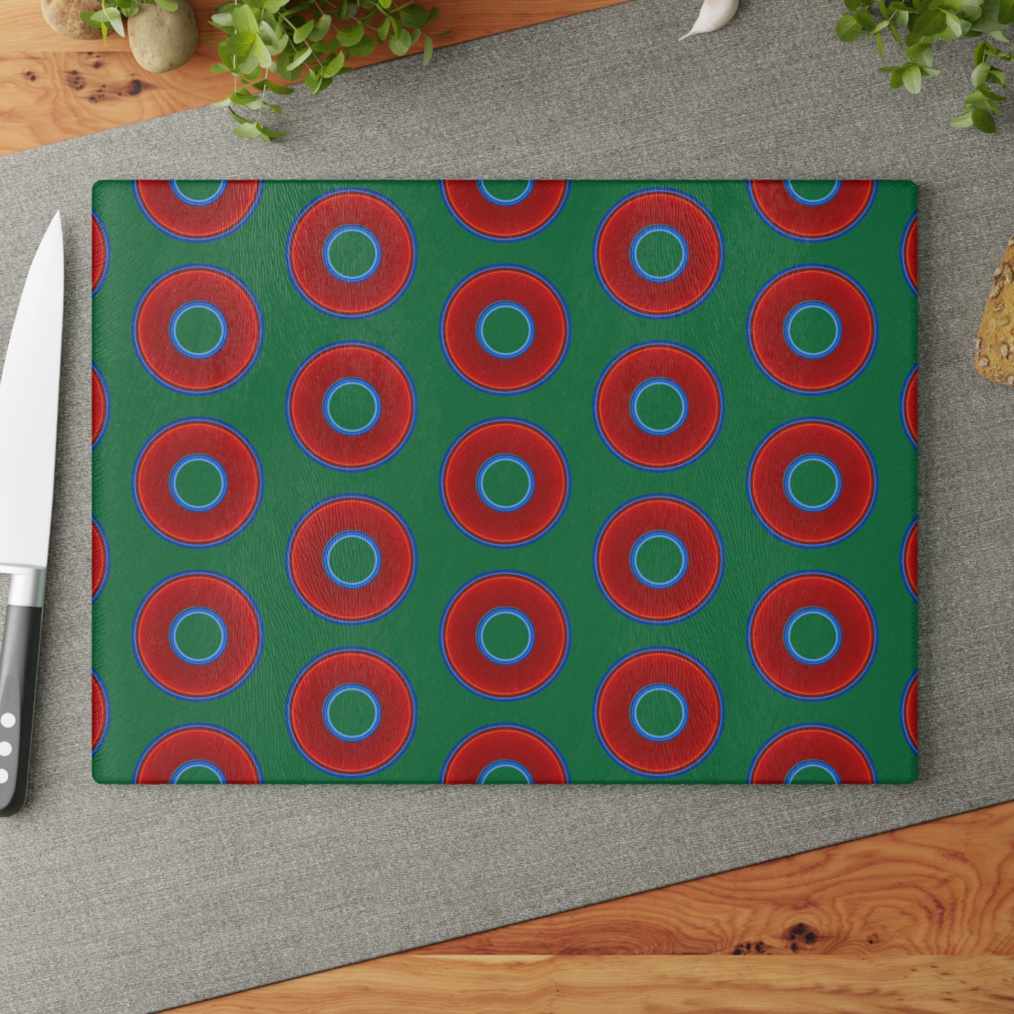 My Friend's Cutting Board - vivid red donuts w/green background