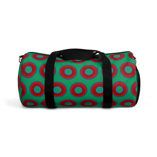 Lumpy Duffel - vivid red donuts w/jade green background