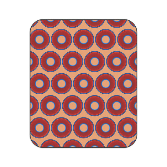 The Lumpy Party Blanket - giant water-resistant outdoor blanket [61" x 51"] - vivid red donuts w/peach background