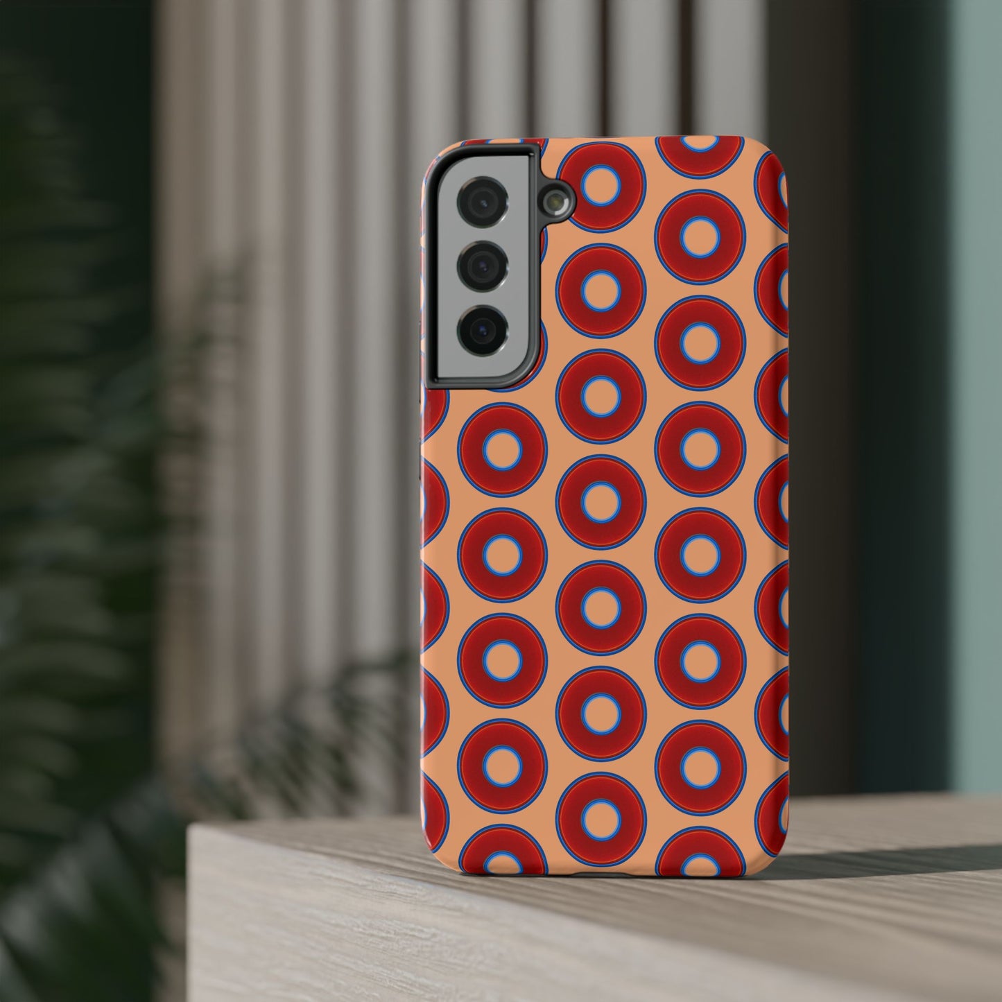 Impact-Resistant Lumpy Donut Case - red vivid donut print w/peach background