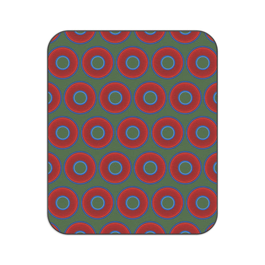 The Lumpy Party Blanket - giant water-resistant outdoor blanket [61" x 51"] - vivid red donuts w/dark green background