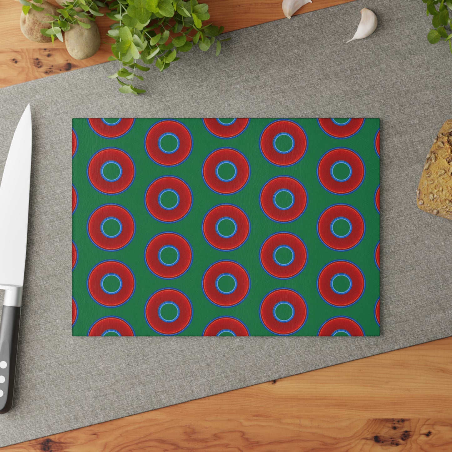 My Friend's Cutting Board - vivid red donuts w/green background