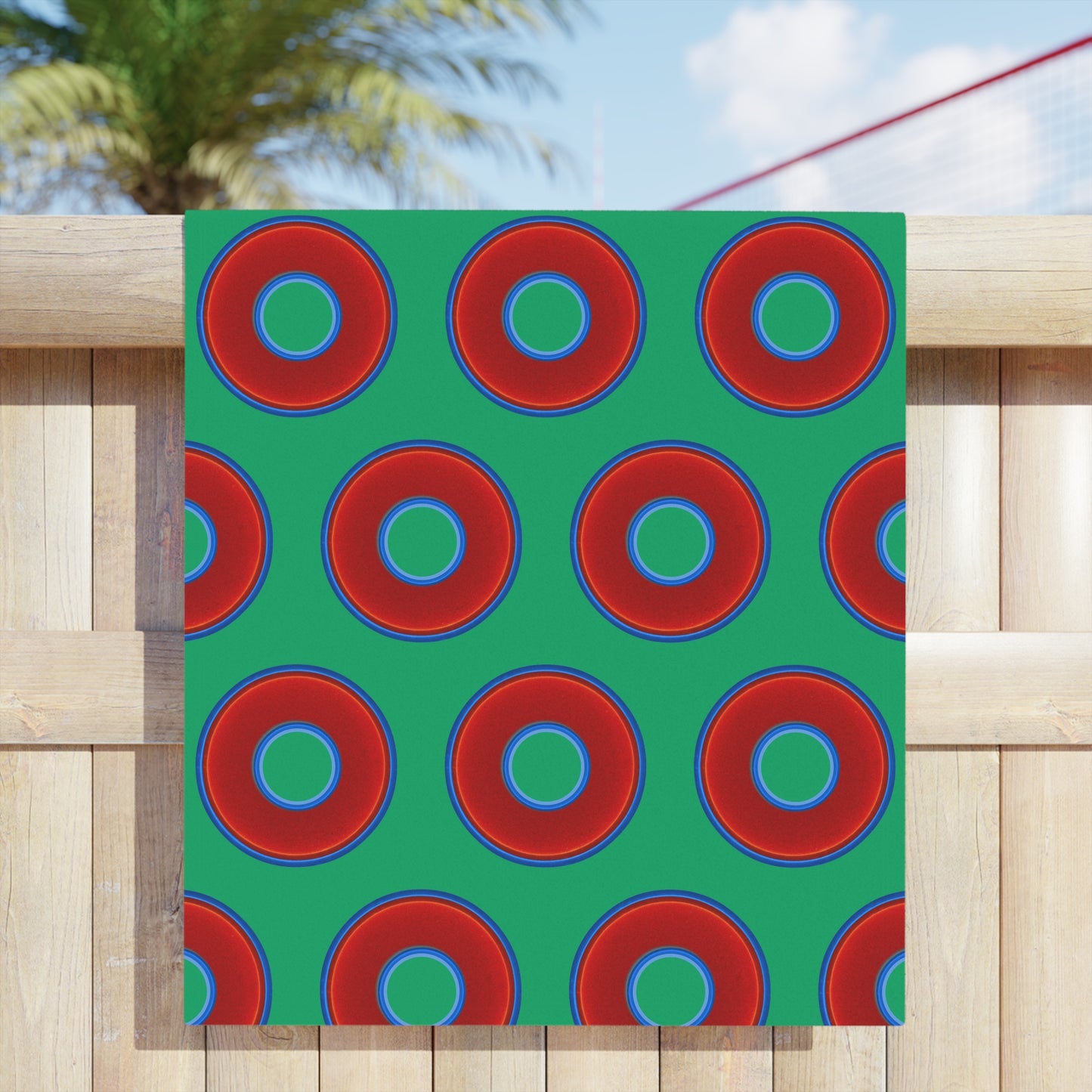 Lumpy Donut Towels - vivid red donuts w/jade green background