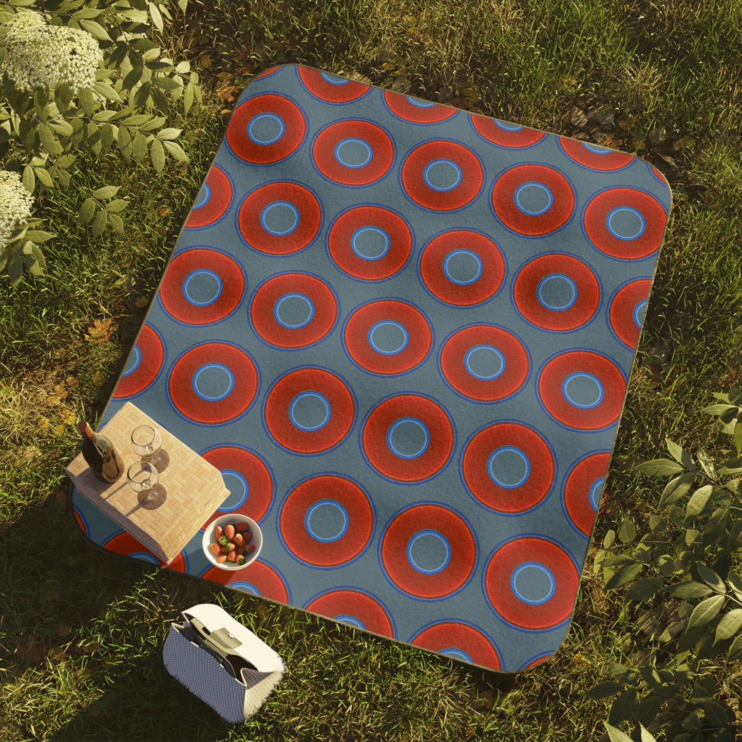 The Lumpy Party Blanket - giant water-resistant outdoor blanket [61" x 51"] - vivid red donuts w/steel blue background