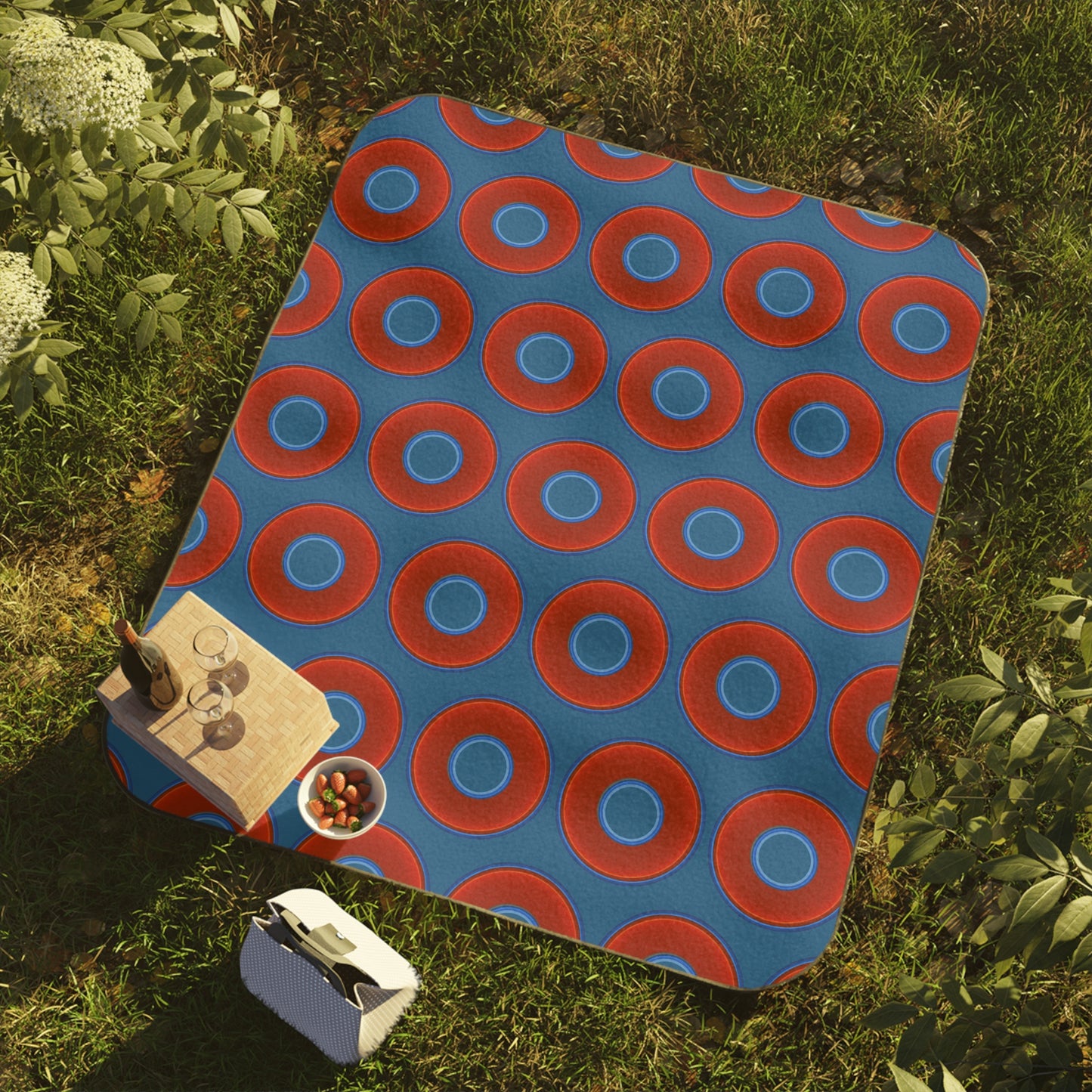 The Lumpy Party Blanket - giant water-resistant outdoor blanket [61" x 51"] - vivid red donuts w/wavy navy blue background