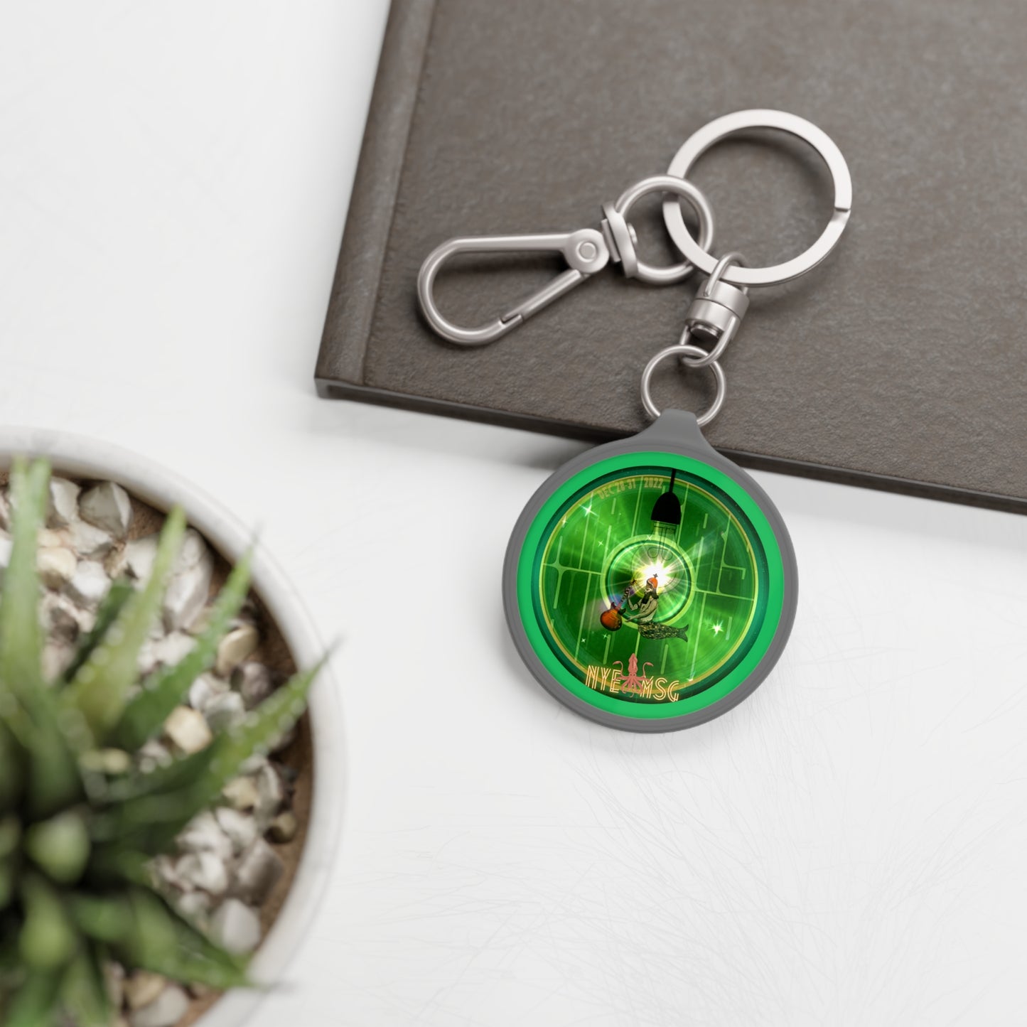 Lumpy Donut Keychain - "There was a party Dec 28-31 2022 in NYC, now tell me where were you" - series 1.0 - green reflective donut w/light on