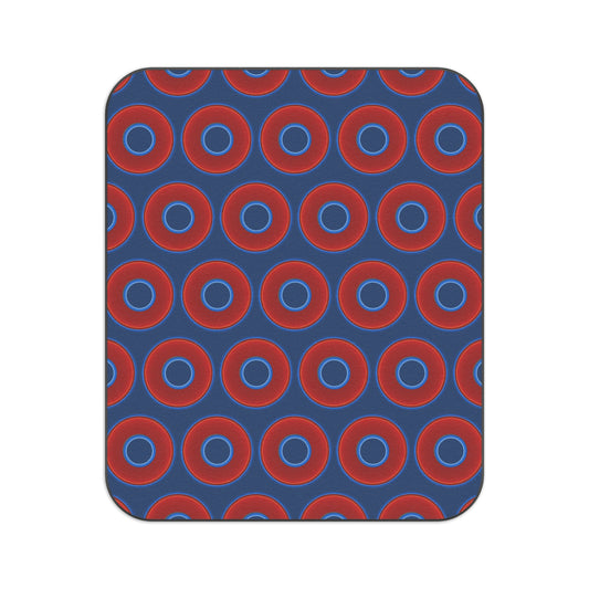The Lumpy Party Blanket - giant water-resistant outdoor blanket [61" x 51"] - vivid red donuts w/Atlantic navy blue background