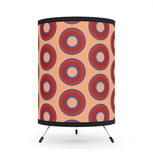 Lumpy Tripod Donut Lamp - vivid red donuts w/peach background