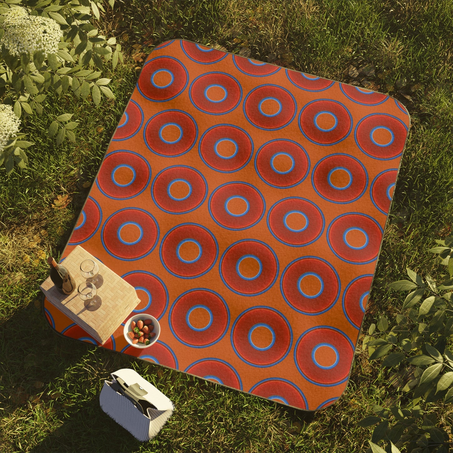 The Lumpy Party Blanket - giant water-resistant outdoor blanket [61" x 51"] - vivid red donuts w/dark orange background