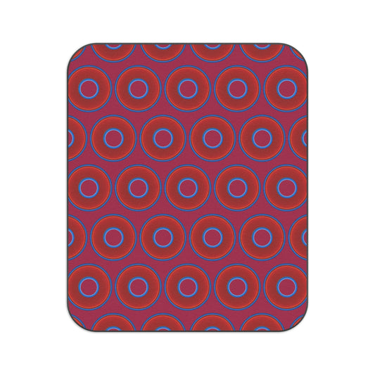 The Lumpy Party Blanket - giant water-resistant outdoor blanket [61" x 51"] - vivid red donuts w/dark magenta background