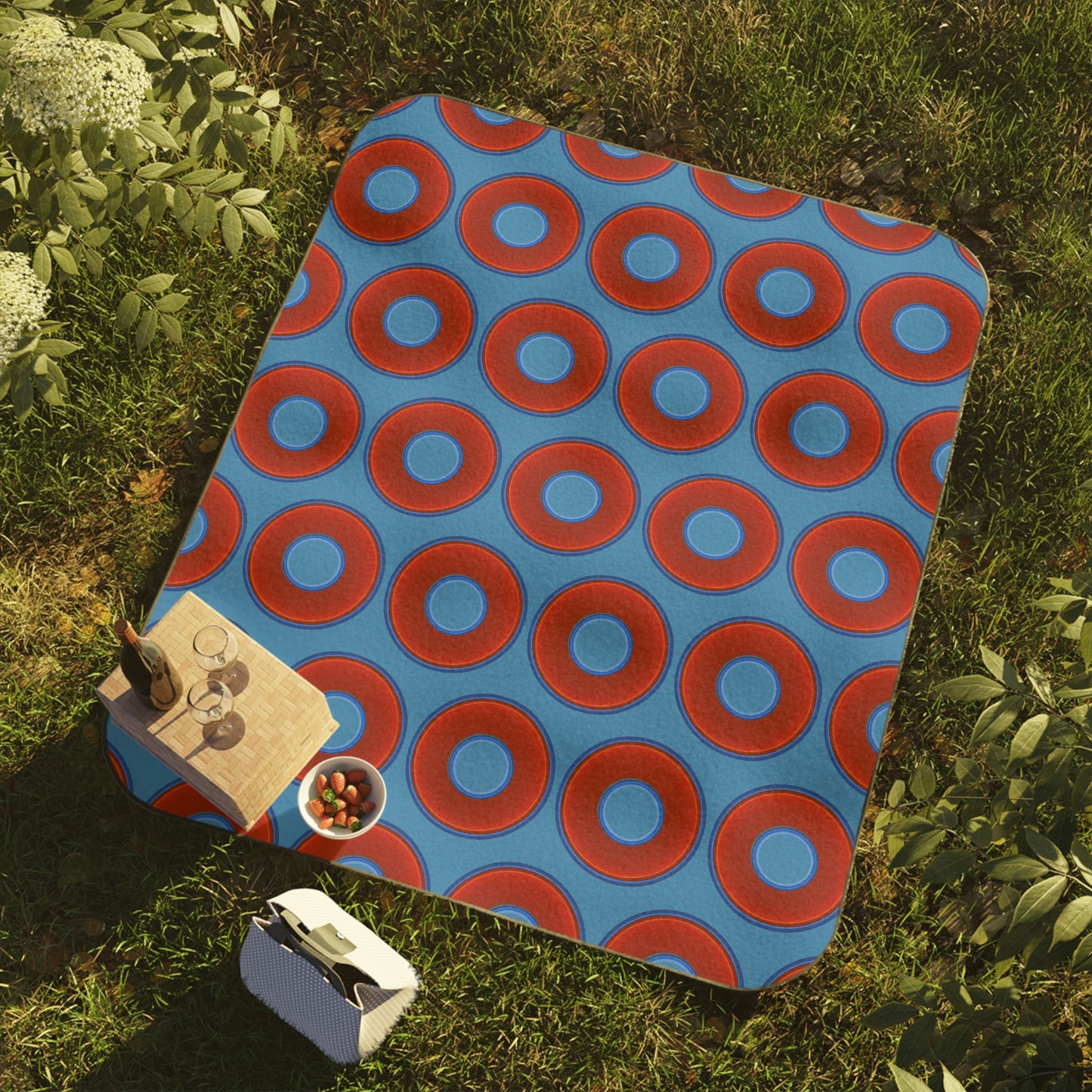 The Lumpy Party Blanket - giant water-resistant outdoor blanket [61" x 51"] - vivid red donuts w/light steel blue background