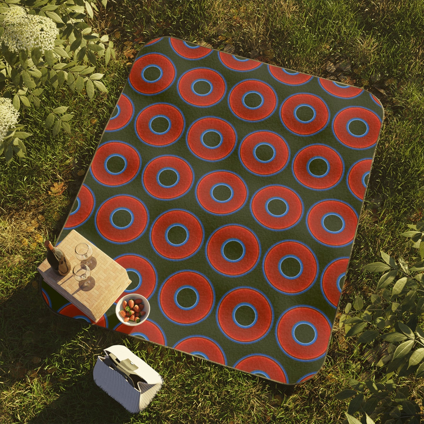 The Lumpy Party Blanket - giant water-resistant outdoor blanket [61" x 51"] - vivid red donuts w/deep forest green background