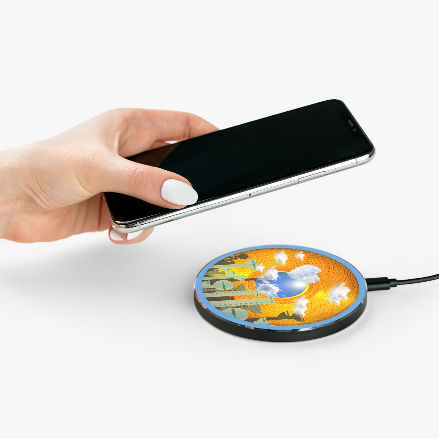 The Flow - Wireless Lumpy Donut Chargers - "The Golden Age of Wireless Donut Chargers" - golden symmetrical donut w/light blue background