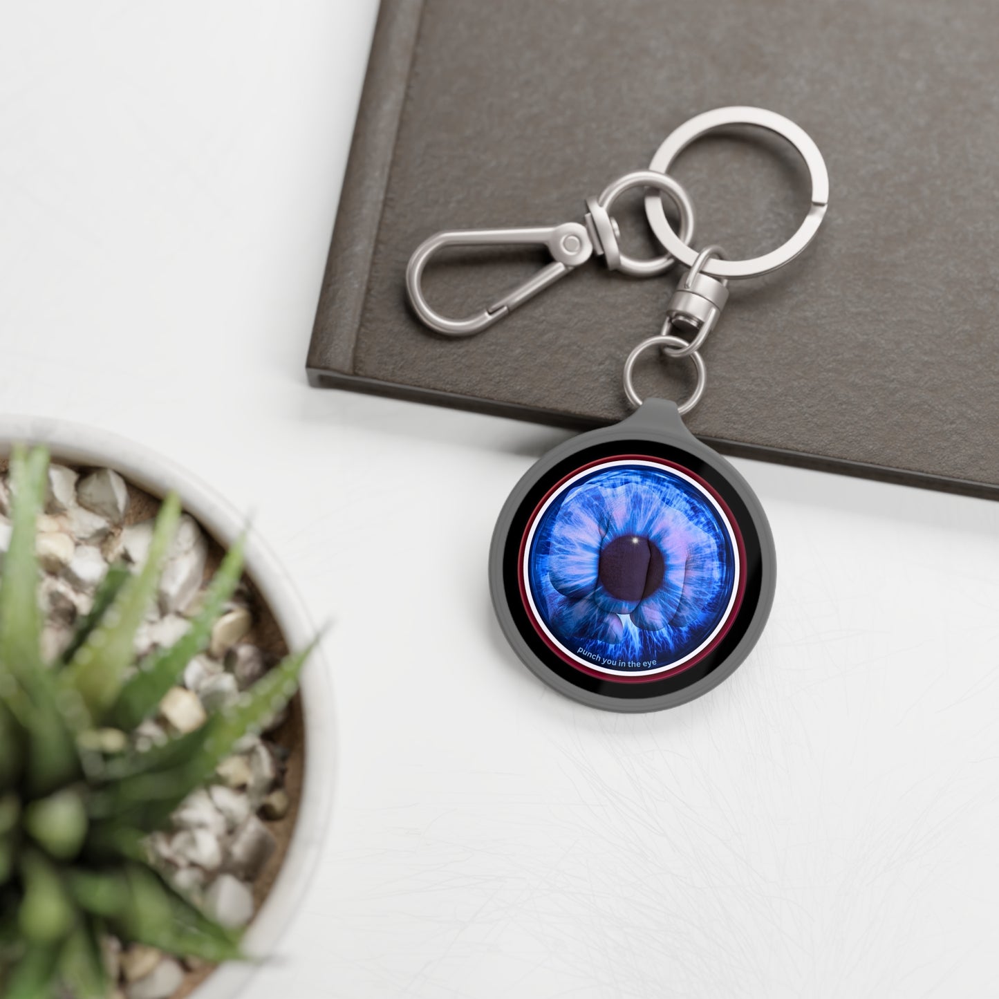 Lumpy Donut Keychain - "The Eye Sore Donut Keychain" - series 1.0 - variant 2 - blue eye donut w/words