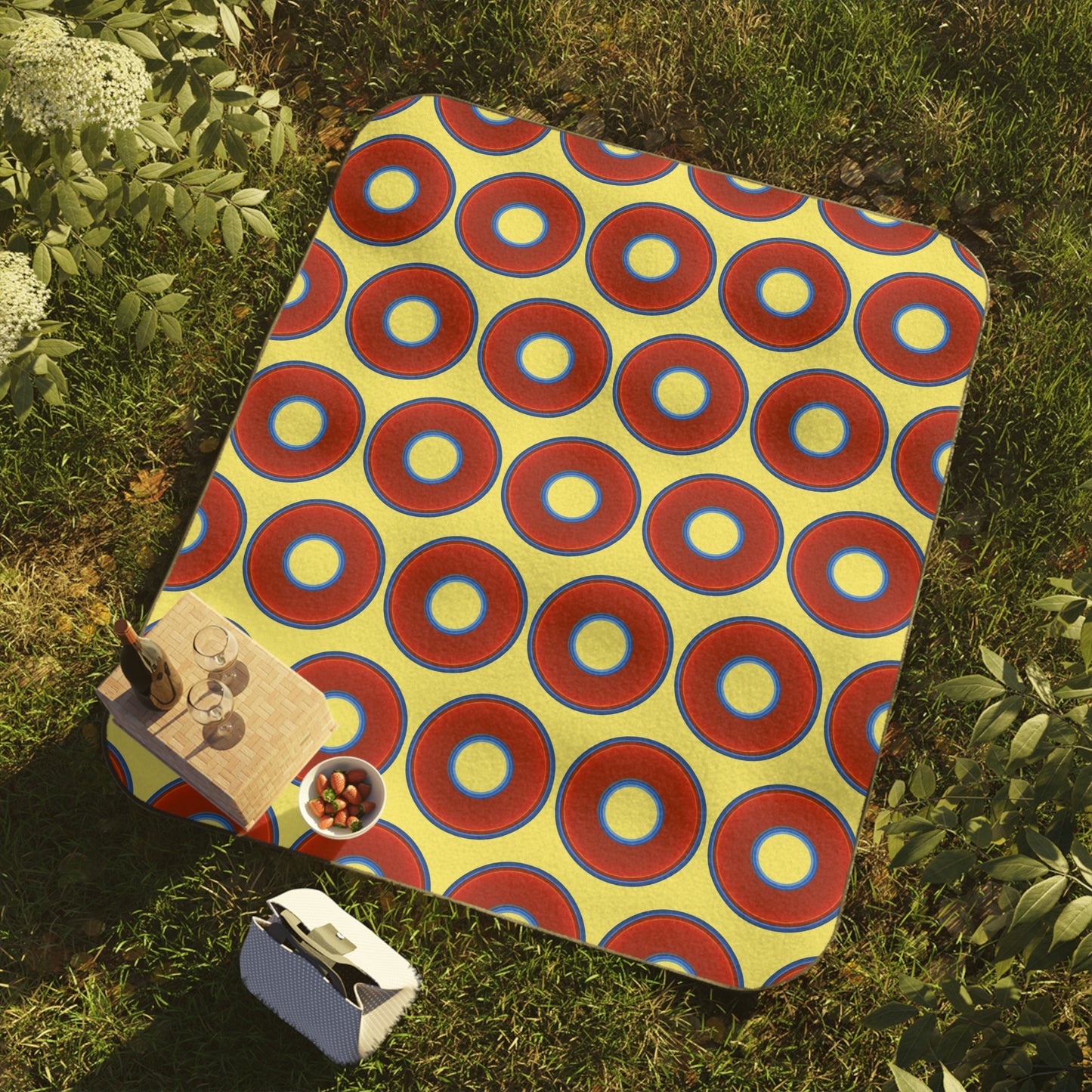 The Lumpy Party Blanket - giant water-resistant outdoor blanket [61" x 51"] - vivid red donuts w/yellow background