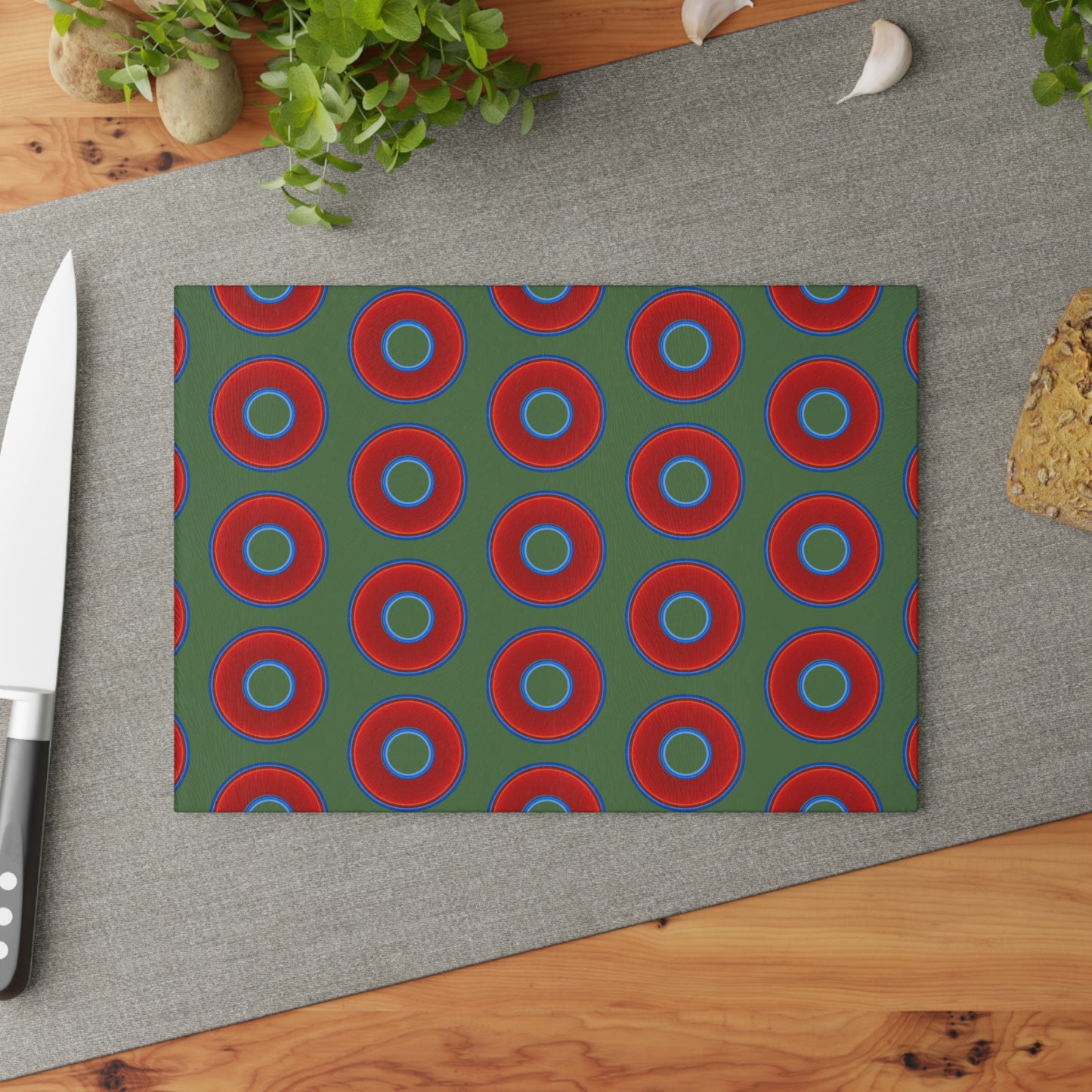 My Friend's Cutting Board - vivid red donuts w/dark green background