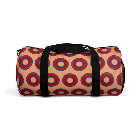Lumpy Duffel - vivid red donuts w/peach background