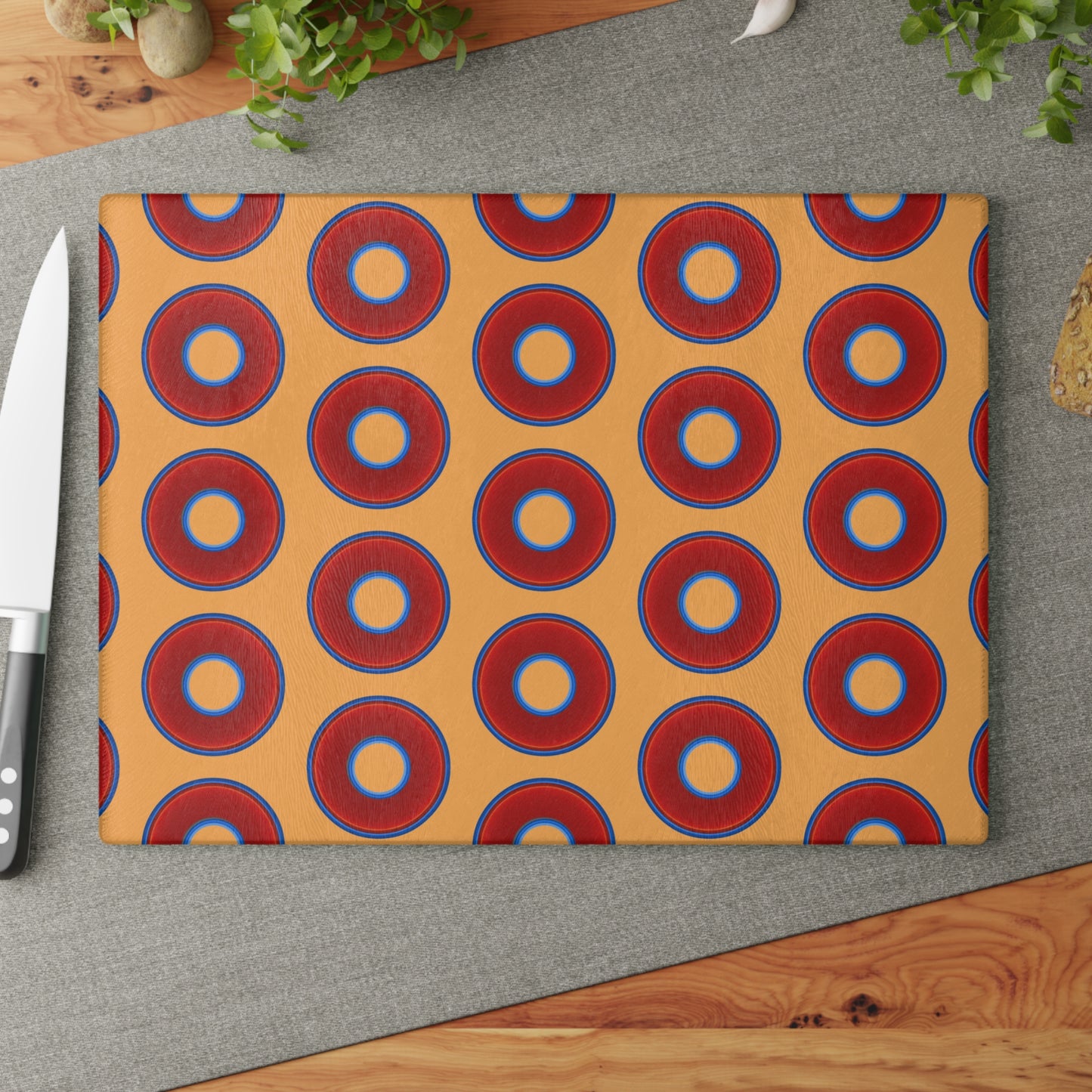 My Friend's Cutting Board - vivid red donuts w/creamsicle orange background